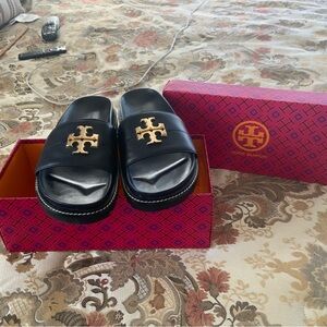 Tory Burch Black and Gold Flats